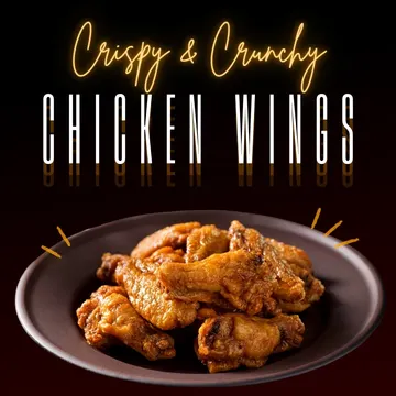 A plate of crispy and crunchy chicken wings is displayed against a dark background. Text above reads "Crispy & Crunchy Chicken Wings.