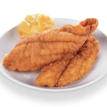 A plate with breaded fried fish fillets and a biscuit.